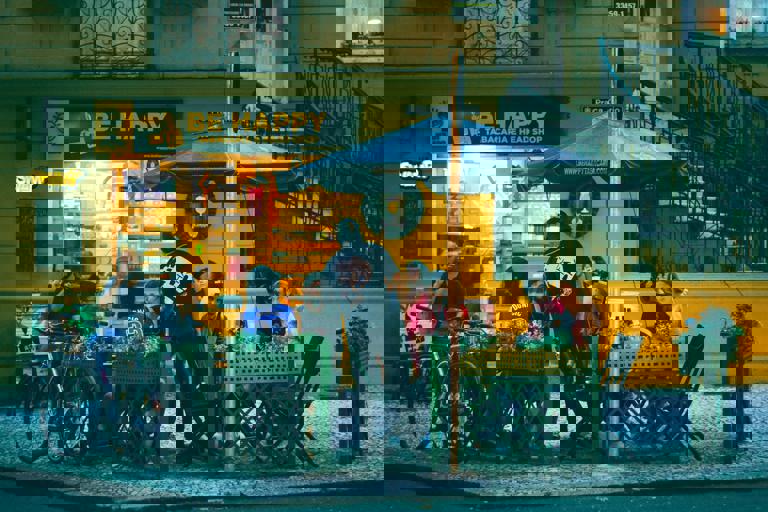 Pop-Up Cycle Cafés Transform Underused Alleyways Into Social Hubs for Commuters